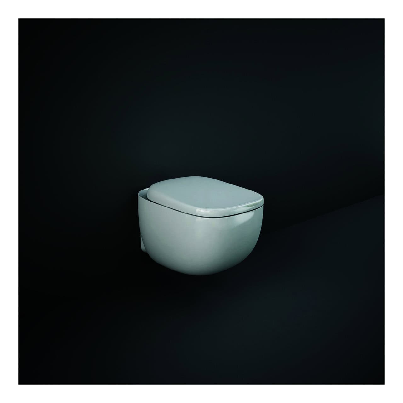 RAK Illusion Rimless Wall Hung Toilet And Soft Close Seat - Alpine White